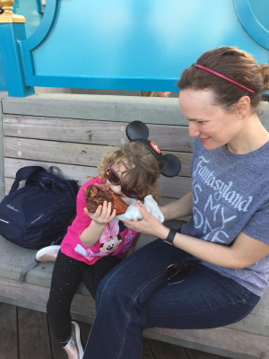 Kelly & Madeleine like to go visit Mickey Mouse and eat delicious turkey legs.