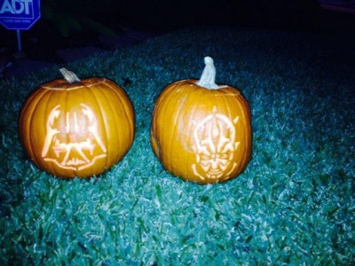 Yearly pumpkin carving. We always have so much fun getting a little messy. We usually match the costume theme.
