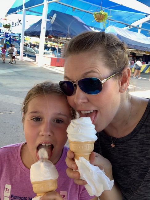 Katie's first taste of pineapple whip at the Texas State Fair. She loved it!