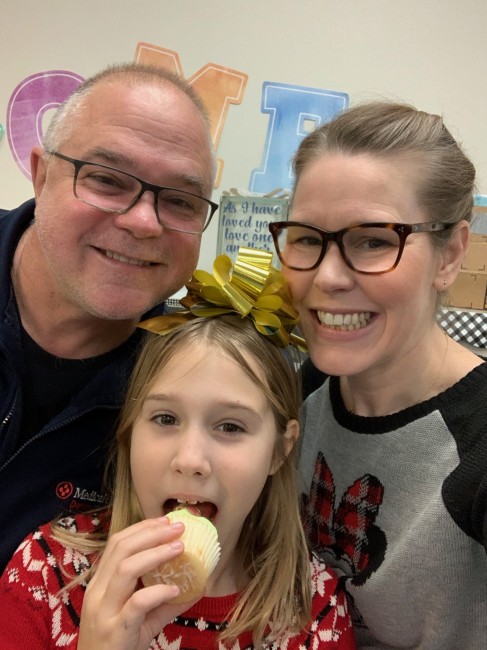 Mom and Dad always enjoy joining in on school party days.