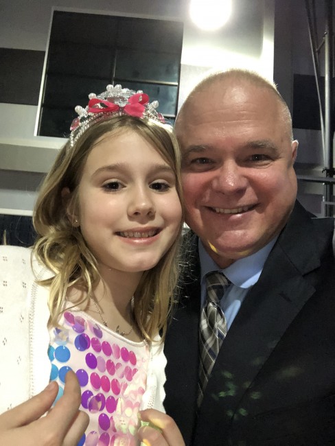 The annual Daddy daughter dance at Katie's school is a chance for Katie to dress up and hang out with her Daddy.