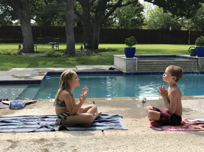 Katie and her cousin enjoying some poolside meditation.