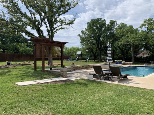 Surrounded by trees, our backyard is our favorite place to spend time!