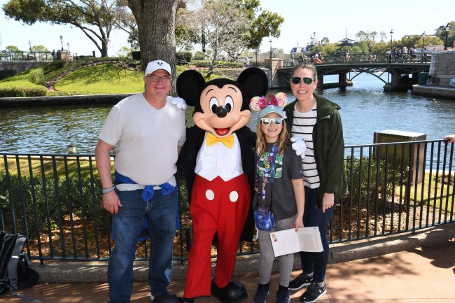 Smiling with the big guy himself, Mickey, in Epcot Center during our first trip to Disney World .