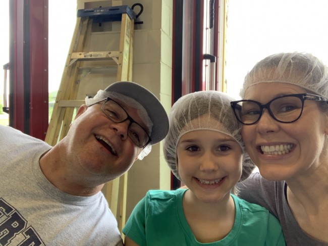 Giving back to our community is important to our family. Here we are, volunteering for Feed My Starving Children where we prepped meals.