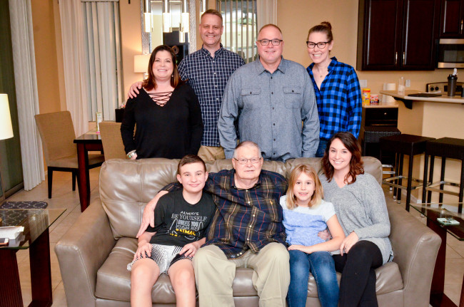This is Tom's family including his father, sister and all of the grandchildren.
