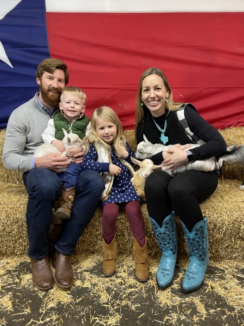 Family day the rodeo and we took a picture with the baby goats Family day the rodeo and we took a picture with the baby goats