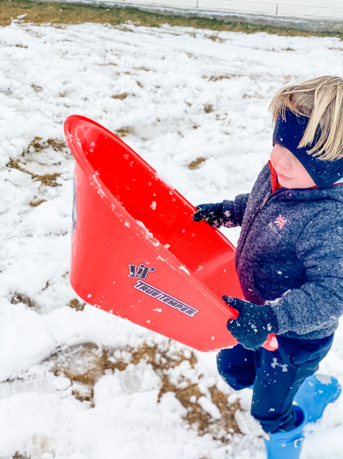 Ryan disassembled the kids' play wheel barrow so they could use it as a sled on a hill in our backyard. Ryan disassembled the kids' play wheel barrow so they could use it as a sled on a hill in our backyard.