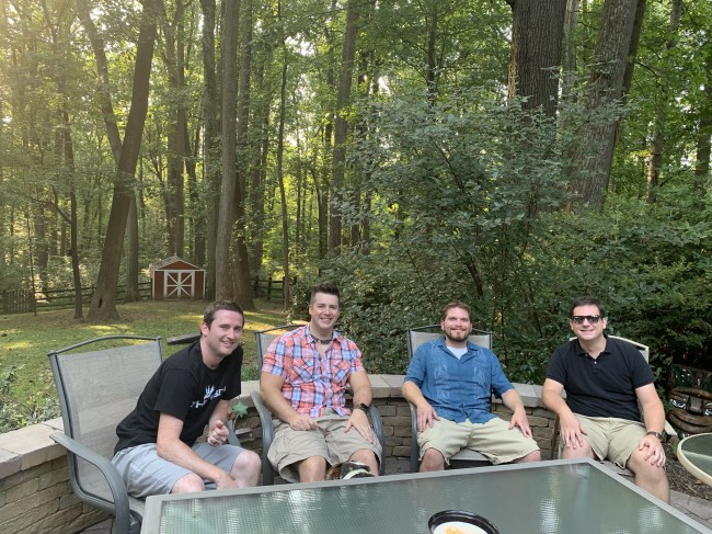 The boys posing for a pic during a summer BBQ.