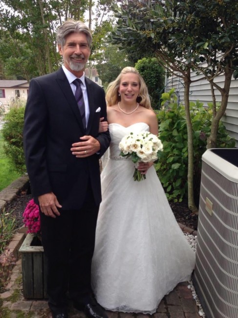 Amy and her dad, walking her down the aisle.