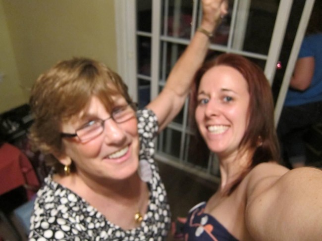 Matt's Mom and Amy's best friend dancing and being silly.