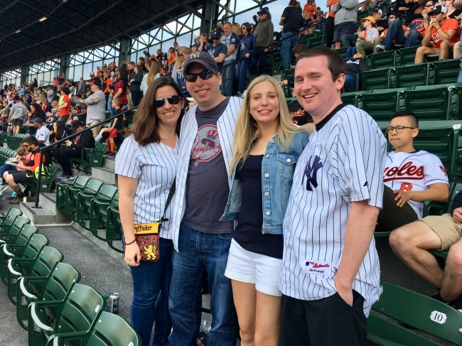 At a baseball game with Amy's Cousin and her husband.