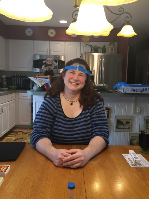 Matt's sister during one of our family game nights. Playing games is one of our regular activities when we are together.