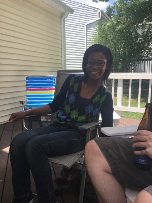 Amy's Sister in law smiling for a pic at a Father's day cookout.