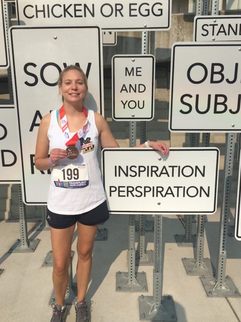 Amy showing off medal! She placed bronze in the 20K cycling event!