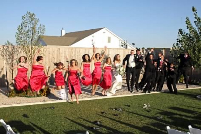 The bridal party jumping for joy!