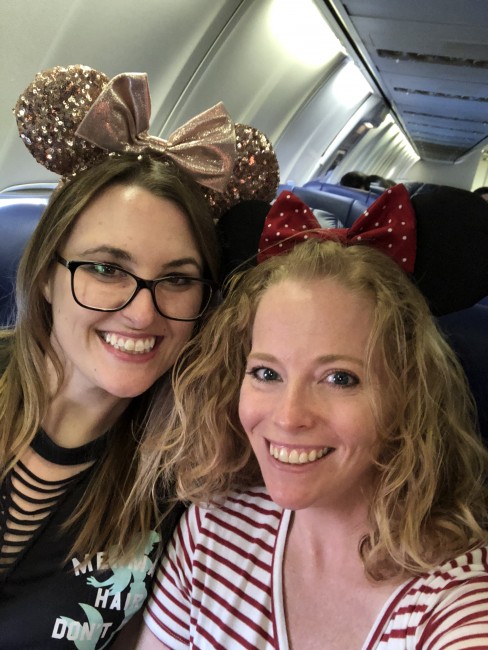 Meaghan and her friend Sarah on their way to Disneyland (ears and all)!