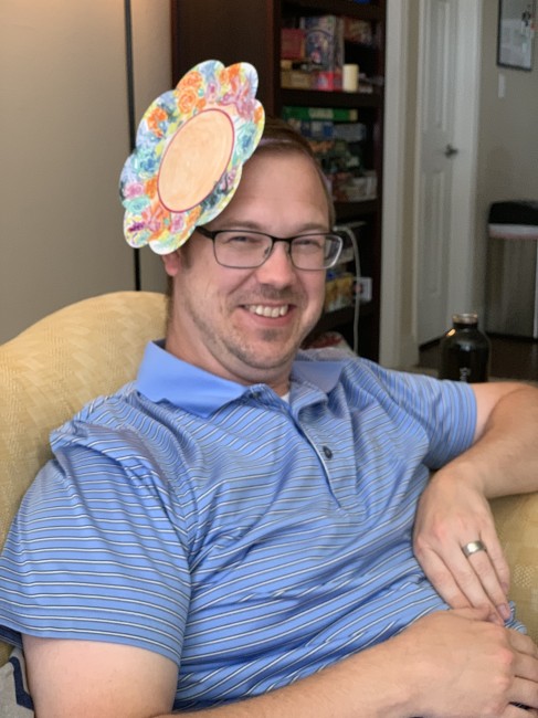 David even got in on the action after-the-fact because Sarah's youngest son requested David try on a hat he had created.