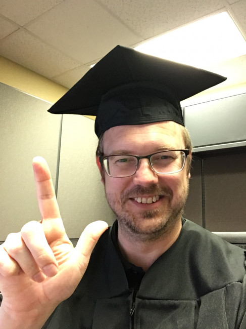 David earned his masters degree but couldn't make it to Lubbock for the ceremony due to work, so he found his old cap and gown and wore them to work! LOL. David earned his masters degree but couldn't make it to Lubbock for the ceremony due to work, so he found his old cap and gown and wore them to work! LOL.