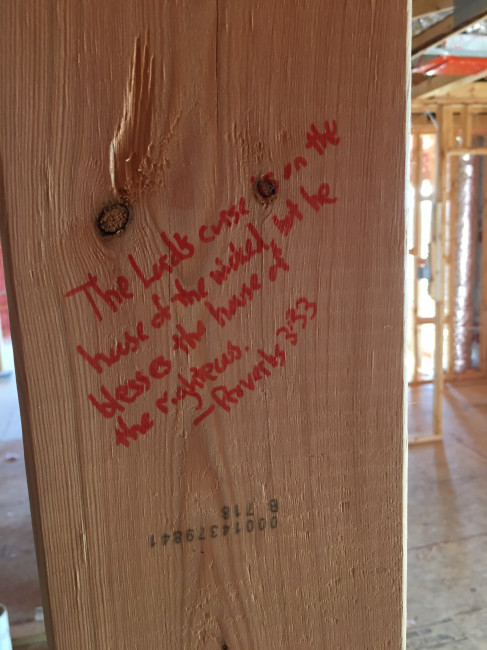 We had a Bless This House ceremony with our church group. We prayed over the house and wrote Bible verses and prayers on the framework. We had a Bless This House ceremony with our church group. We prayed over the house and wrote Bible verses and prayers on the framework.