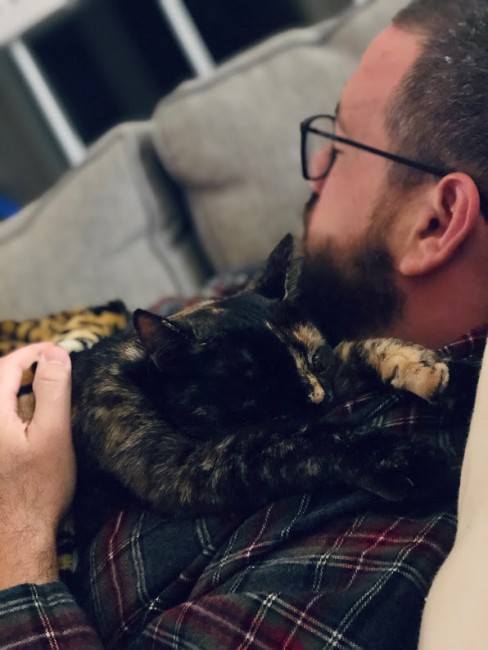 Beans LOVES to snuggle with Stephen. He doesn't mind very much :)