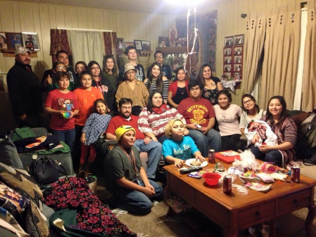 This picture was taken two Christmas's ago at Amanada's grandmother's house. This is a picture of grandkids and great grandkids that were in attendance. There's much more of us -more like 97!