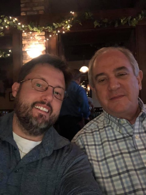 Wyatt and his dad at a birthday dinner