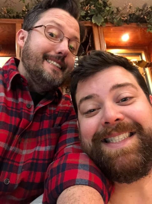 Wyatt and his brother cheesing Christmas morning.
