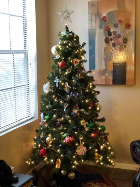 We love to decorate our Christmas tree as a family whole watching Home Alone.