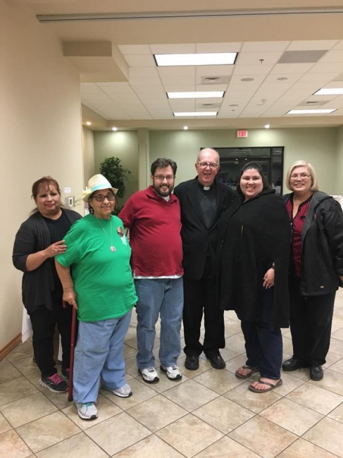 A few years ago we went back to my hometown to visit the priest who married us. He has married everyone in my family for three generations and just recently retired. Pictured with us are my aunt, grandmother and Mom.