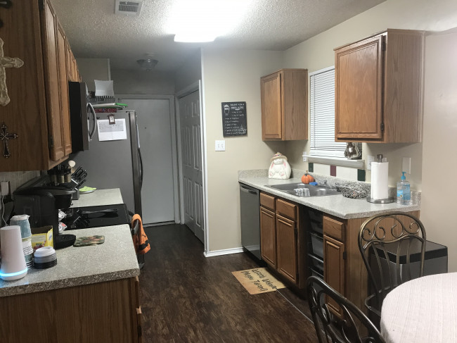 Our kitchen is a very spacious galley style that allows us to cook together which was something that was somewhat difficult to do in our townhome.
