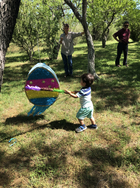 Conner taking a swing at the pinata!