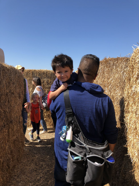 Jeff and Conner trying to find their way out of the straw maze.