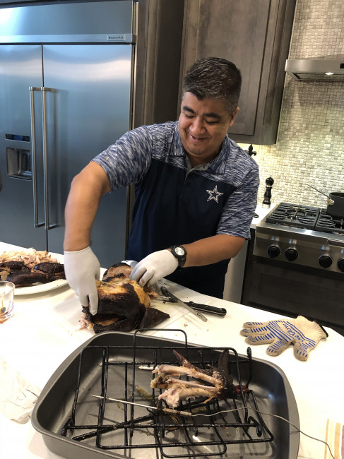 Jeff carving the turkey that he smoked. It was so good!!