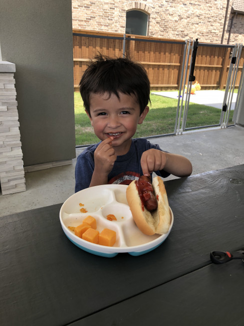 Conner grilling and chilling on our back patio.