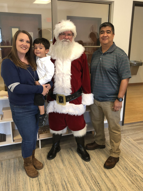 Jeff, Tracie, Conner and Santa during Conner's Christmas program at his preschool.