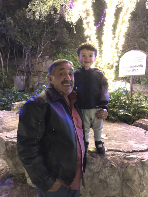 Popo and Conner enjoying the Christmas lights.