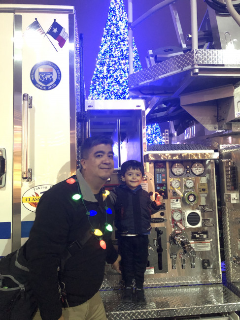 Jeff & Conner enjoying a Cowboy's Christmas!