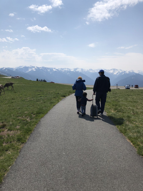Conner walking with Mimi and PawPaw on Hurricane Ridge.
