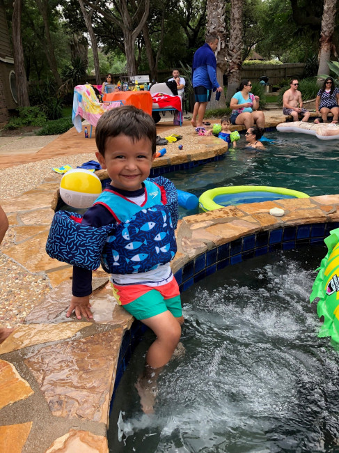 Conner taking a dip in the pool during his birthday party.