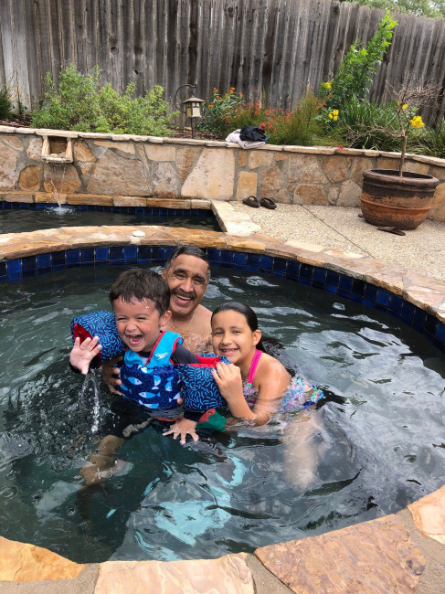 Popo, Conner and his cousin playing in the hot tub for his birthday.