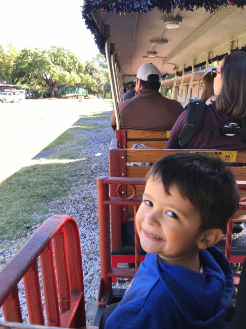 Conner loves riding the train while visiting Kiddie Park in San Antonio.