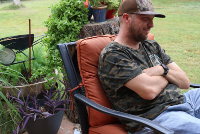 We love hanging out on our back porch. We have it set up with chairs, table, tv and my grill. I love grilling and being outside. - Courtney