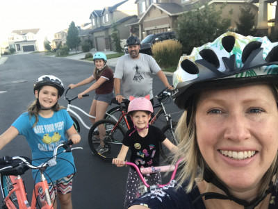 We have a great neighborhood to ride our bikes around. We love going to the top of the hill and gliding down!