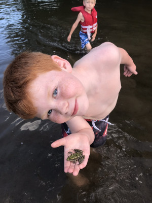 Summers are for playing in the river behind our house! Swimming, kayaking, campfires, and just relaxing.